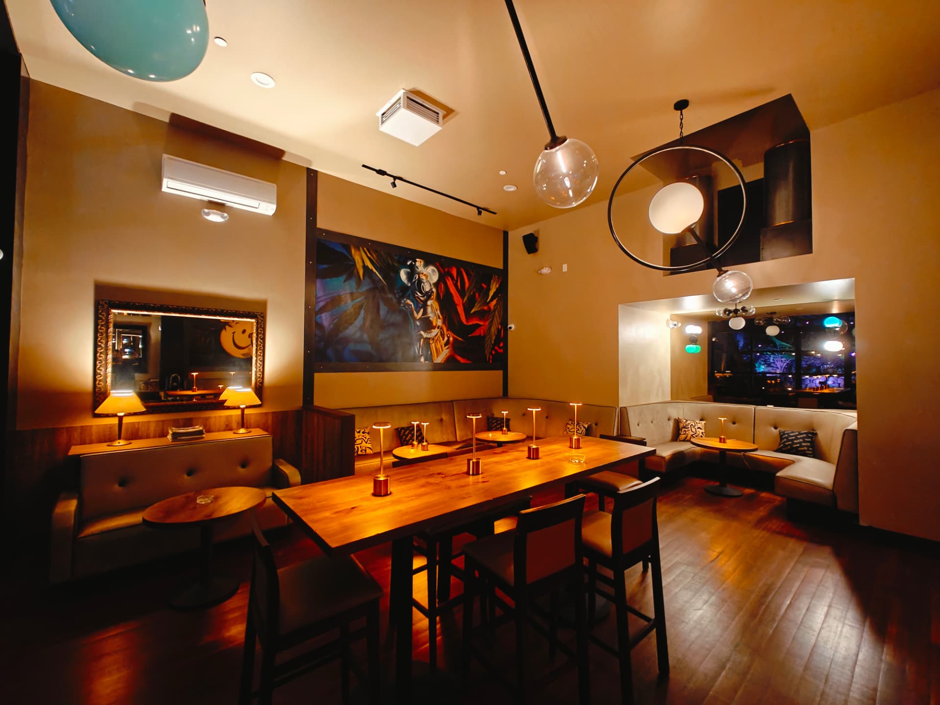 The lounge at Russian Hill Cannabis Club with booth seating and warm lighting